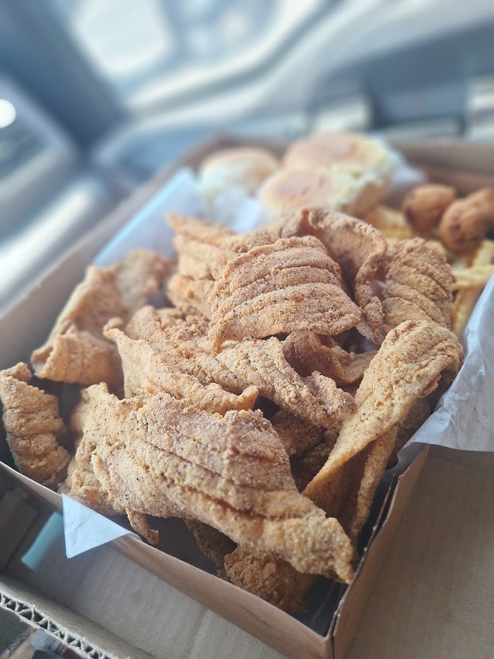Fried rice and seafood choices on display.