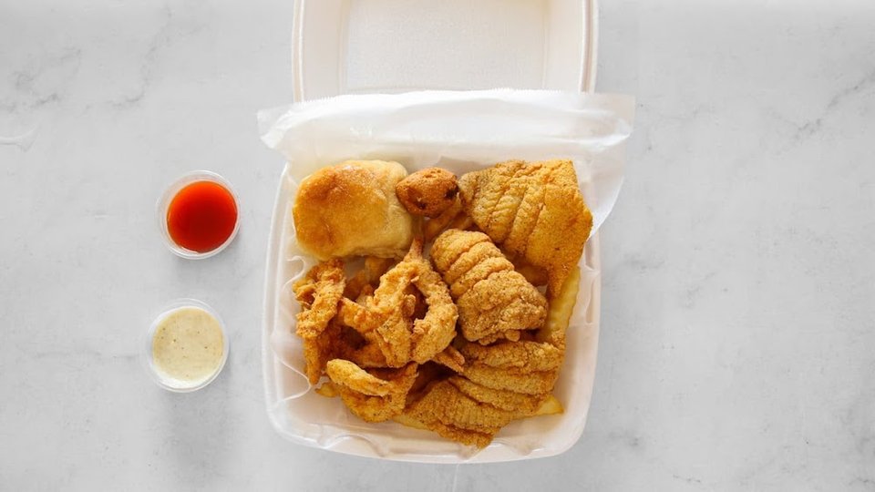 Combo meals listed on a simple menu board.