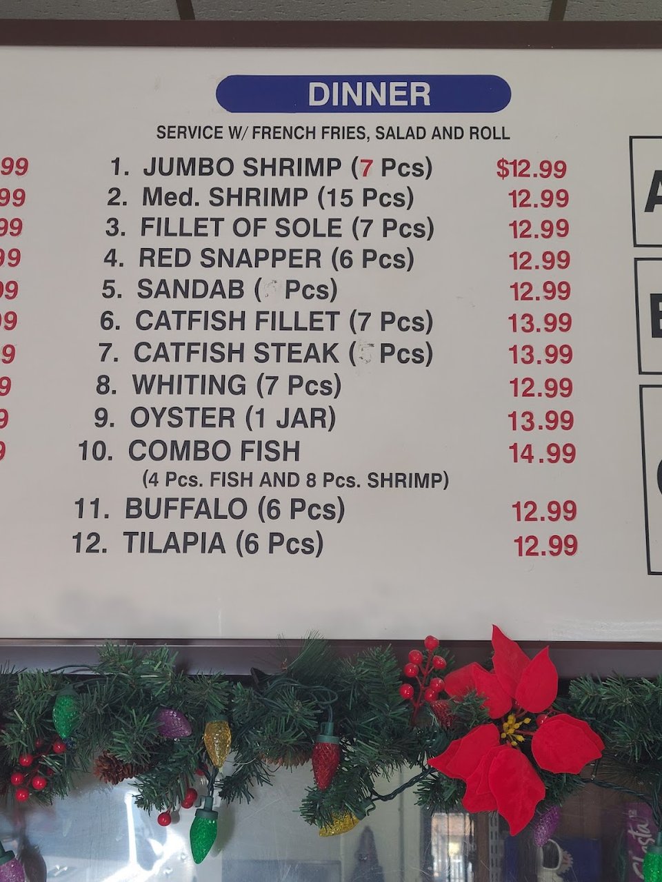 Fried rice and seafood choices on display.
